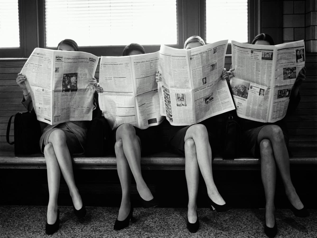 ladies reading the news